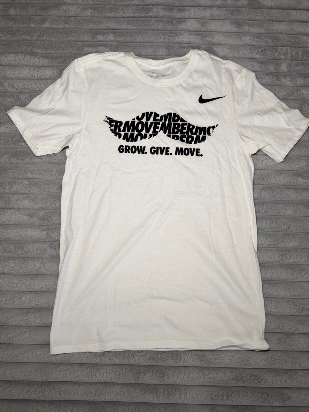 Nike White Short-Sleeve Graphic Tee with Black Swoosh